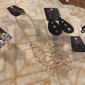 Paparazzi Radiant Gold Interlinked Necklace with 7 sets of earrings